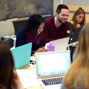 students with laptops