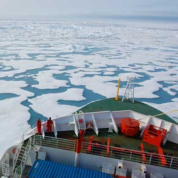 ship navigating icy waters